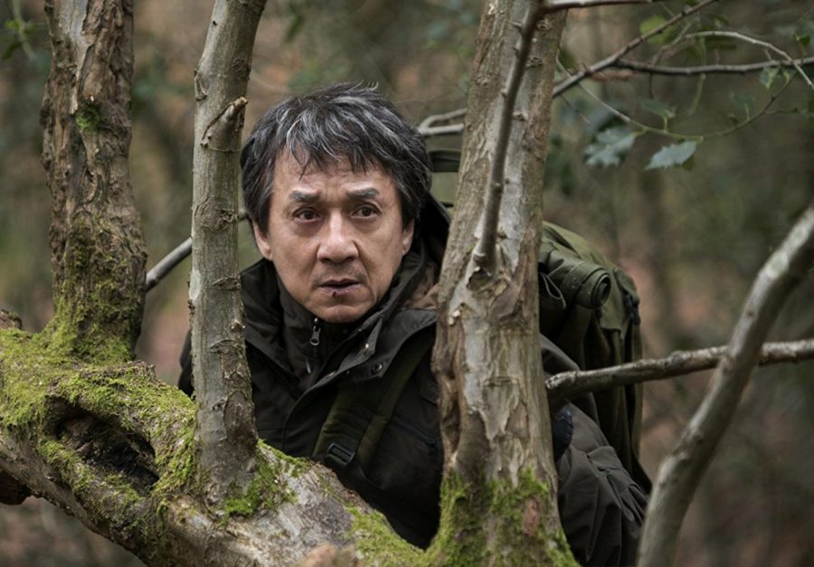 Photo courtesy of imdb.com. Quan (Chan) hides in the woods from pursuing attackers of the IRA sent by Hennessy.