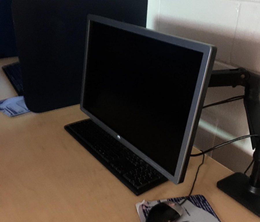 A turned off computer sits in Mr. Billington’s classroom. When the power went out on January 12, most of the computer labs lost power and students were not able to use their computers. 
