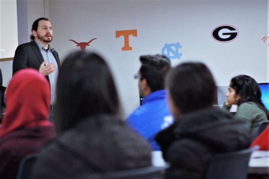 Students receive unique insights into the hiring process as David Delaney, a professional recruiter at Yext, discusses strategies for crafting a strong resume.