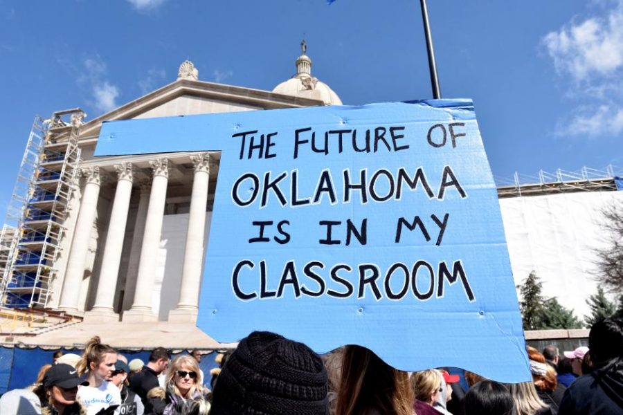 Teachers rally outside the state Capitol on the second day of a teacher walkout to demand higher pay and more funding for education in Oklahoma City, Oklahoma, U.S., April 3, 2018. 
