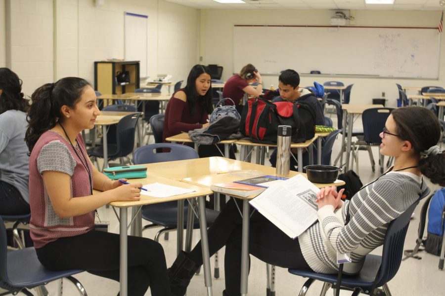 During a tutoring session at the Writing Center, sophomore Sarah Luthra helps out a tutee with a homework assignment. 