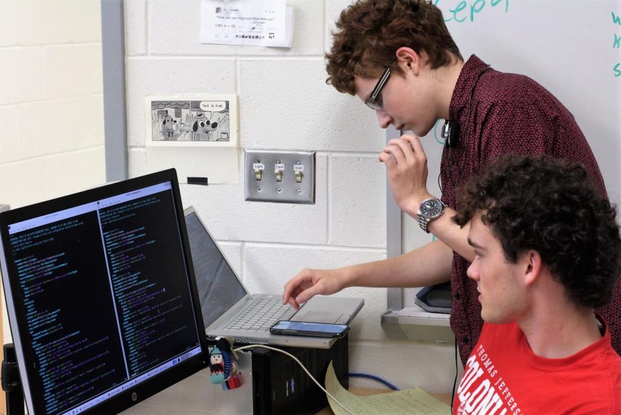 Junior Keegan Lanzillotta and senior Jack Duvall work on getting the lab and its services functioning again. Jefferson students are responsible for running, maintaining, and improving the services themselves. "We like to think that no matter who is running the services, they wouldn’t be able to respond any better [to this issue], although they might have more time available," Lanzillotta said. "If it was a full-time job to work on this they might be able to get things back up quickly."