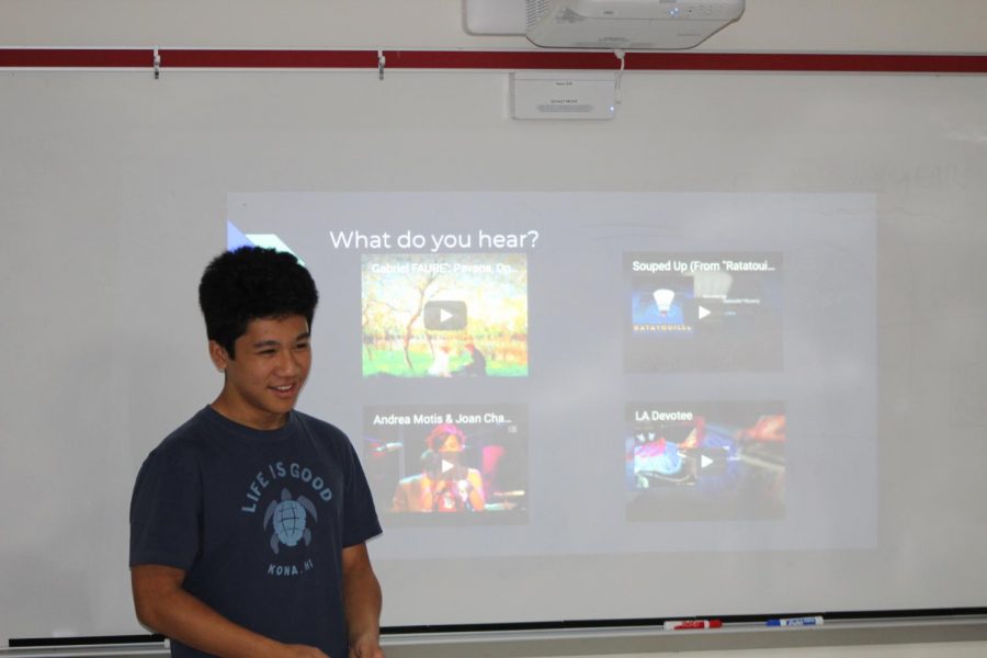 Club organizer Evan Huang facilitates a discussion on the song “Souped Up” from the Disney and Pixar film, Ratatouille, analyzing various themes and motifs and questioning the emotions that were felt during the piece. 