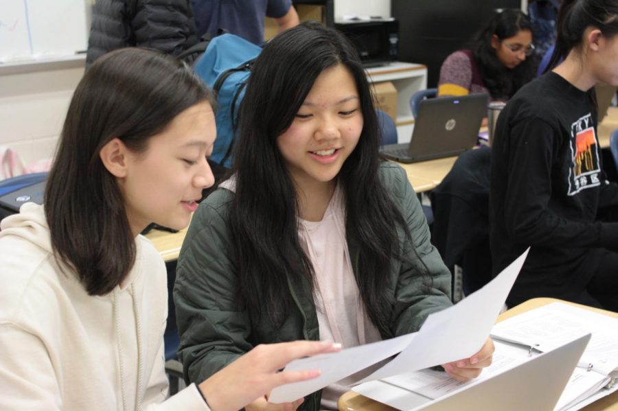 Every eighth period, Jefferson students spend time with younger students, hoping to inspire the same joy in learning they experience with their peers, like freshmen Alissa Rask and Alice Ji, at school. 