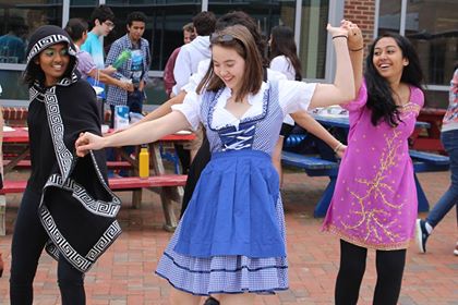 Attendees dance to German Music