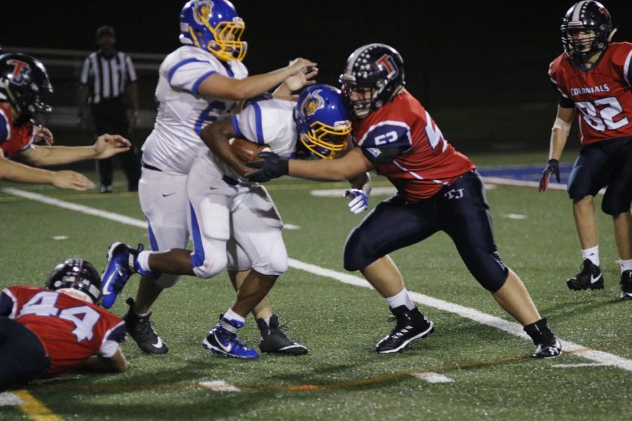 The Colonials defend the run in the end zone