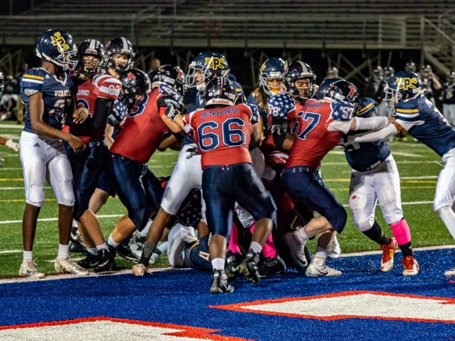 The Colonials score the winning touchdown in double overtime