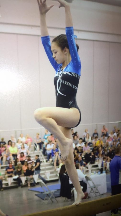 Freshman Alyssa Rask participates in a club gymnastics tournament, but will be making a switch to the TJ gymnastics team this season.