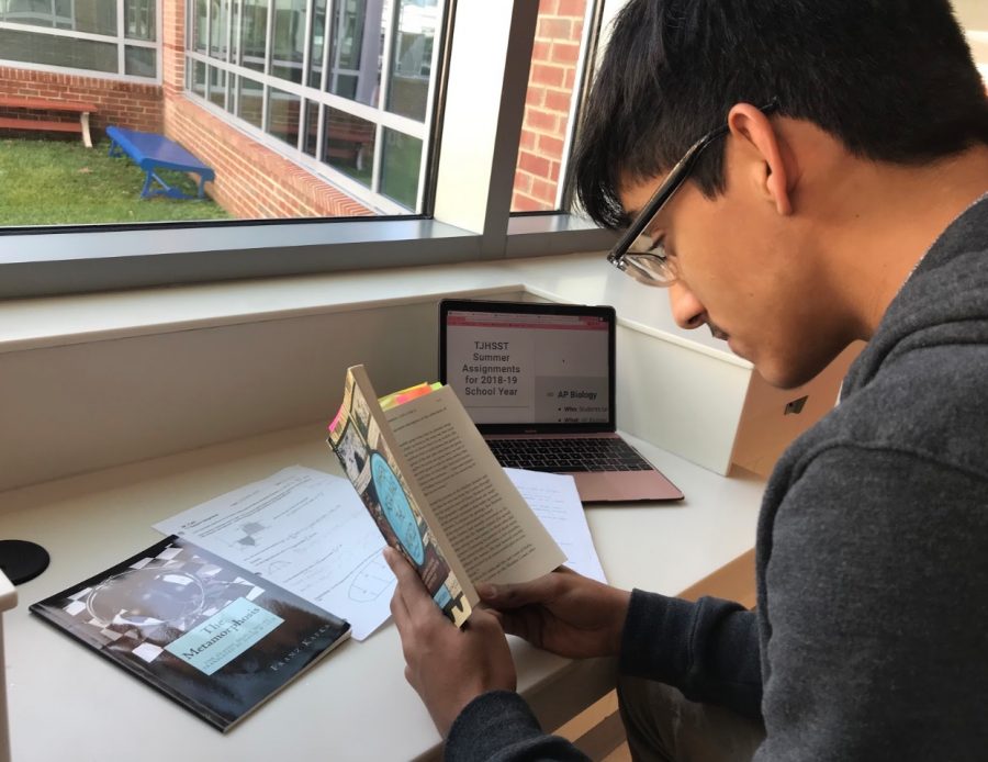Sophomore Ikhlaas Bhat reads When Asia was the World, a book that was given to read as a summer assignment before the year began. 