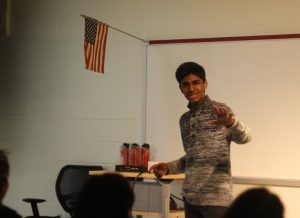 At the Poetry Out Loud competition, senior Yash Shekar presents his poem, using a variety of hand gestures and demonstrations to bring the poem to life.