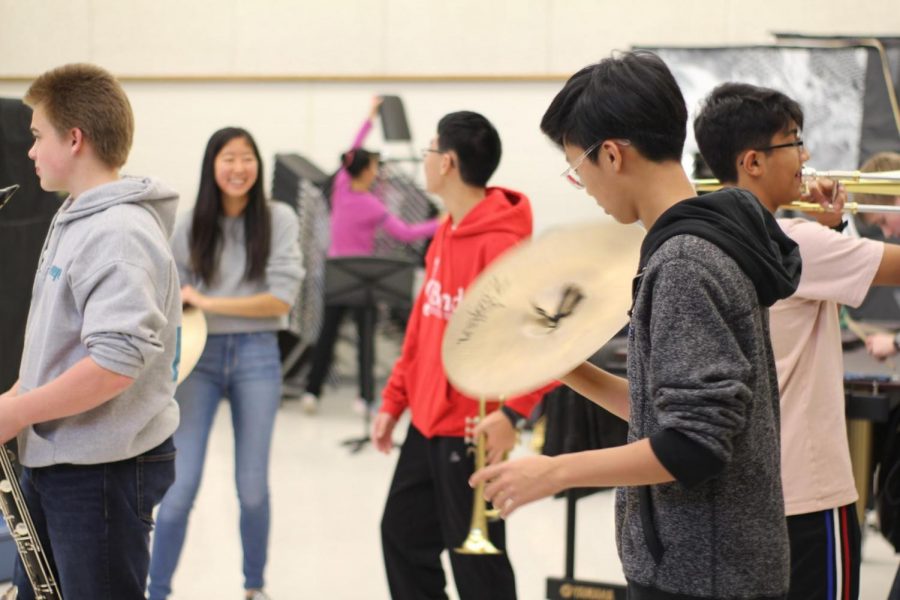 From left to right: Freshmen Jeb Barker, Juliette Kim, Andrew Lam, Yoobin Kwon, and Farhan Ayaan. TJ students pursuing humanities often delve deeper into humanities-activities from middle school such as band. “Humanities classes/activities—  specifically, band and TJMC — that Ive taken at TJ have reinforced my love for that field,” junior Sophie Uy said. 