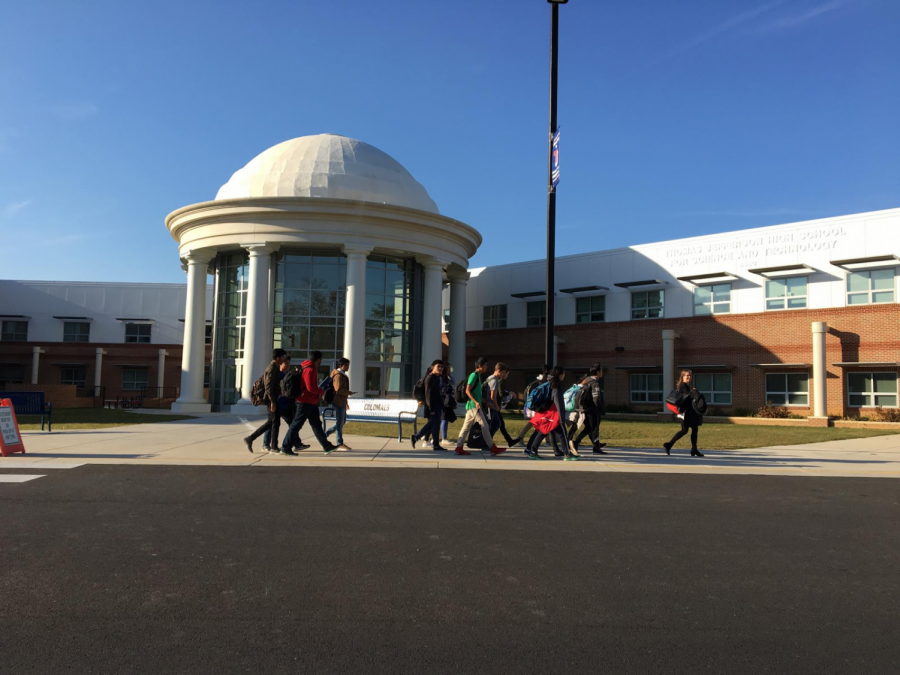 The+Holmer+Middle+School+tutors+walking+from+the+Jefferson+dome.+Photo+courtesy+of+TJHSST.