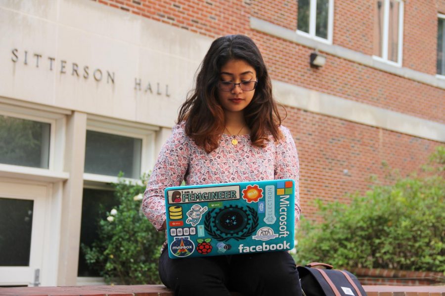 Jefferson+Class+of+2016+graduate%2C+Sweta+Karlekar%2C+is+working+on+her+laptop+outside+of+Sitterson+Hall+on+the+UNC+Chapel+Hill+campus.