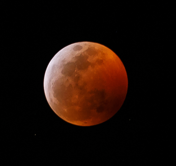 The Super Blood Wolf Moon Eclipse, approaching totality in this photo, appeared on Jan. 20 as the first lunar eclipse of the year.