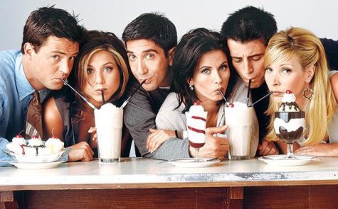The six friends characters, Chandler (far left), Rachel, Ross, Monica, Joey, and Phoebe (far right) in this iconic photo of them enjoying sundaes.