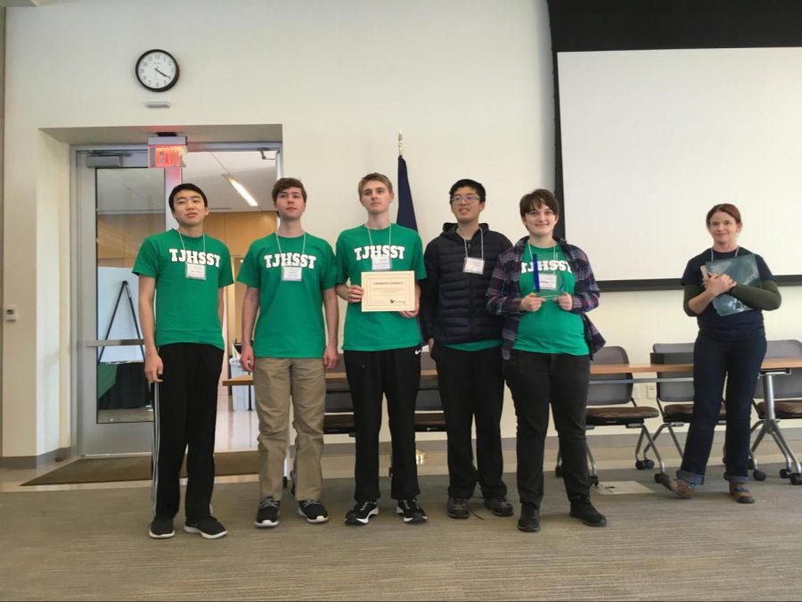 (From left to right: sophomore Alex Zhang, junior Kenny Johnson, senior Mark Putman, sophomore Chris Kan, senior MJ Old) Jefferson’s Ocean Bowl A Team stands with their certificate and trophy for the Chesapeake Bay Bowl, a first for the club in five years.