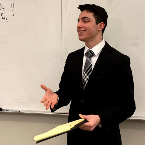 Jefferson’s Congressional Debate captain, Dany Matar, smiles at his audience as he finishes his first speech in the 2018-2019 Metrofinals competition.