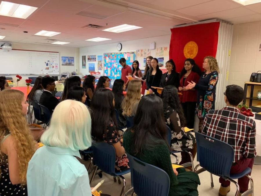 On March 6, the Spanish Honor Society of TJHSST welcomed the new members of their club during an induction ceremony. There, they sang Spanish songs, lit candles, and received plaques from Sra. Mateo and Sra. Gendive. Photo courtesy of Connie Ryu.