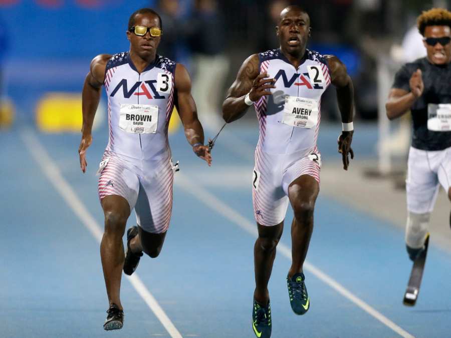 Visually impaired runner David Brown (left) and guide Jerome Avery compete in 2015 Paralympics. Photo courtesy of creative commons.