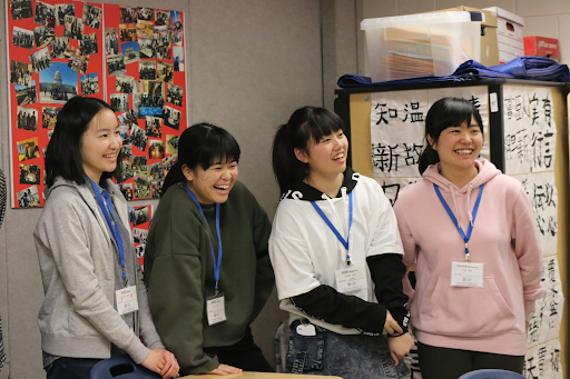 Chiben students Aiko Kouda, Kako Okada, Juri Nakaima, and Chika Nakamori laugh in delight as their teacher introduces himself.