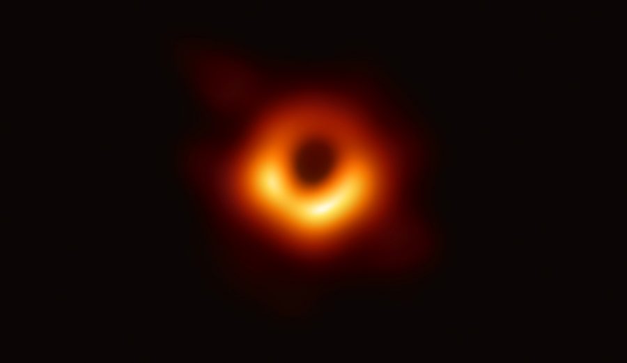 Image+courtesy+of+www.NASA.gov.++Astronomers+take+the+first+picture+of+a+black+hole+-+although+since+even+light+escapes+a+black+hole%2C+the+image+depicts+its+shadow.