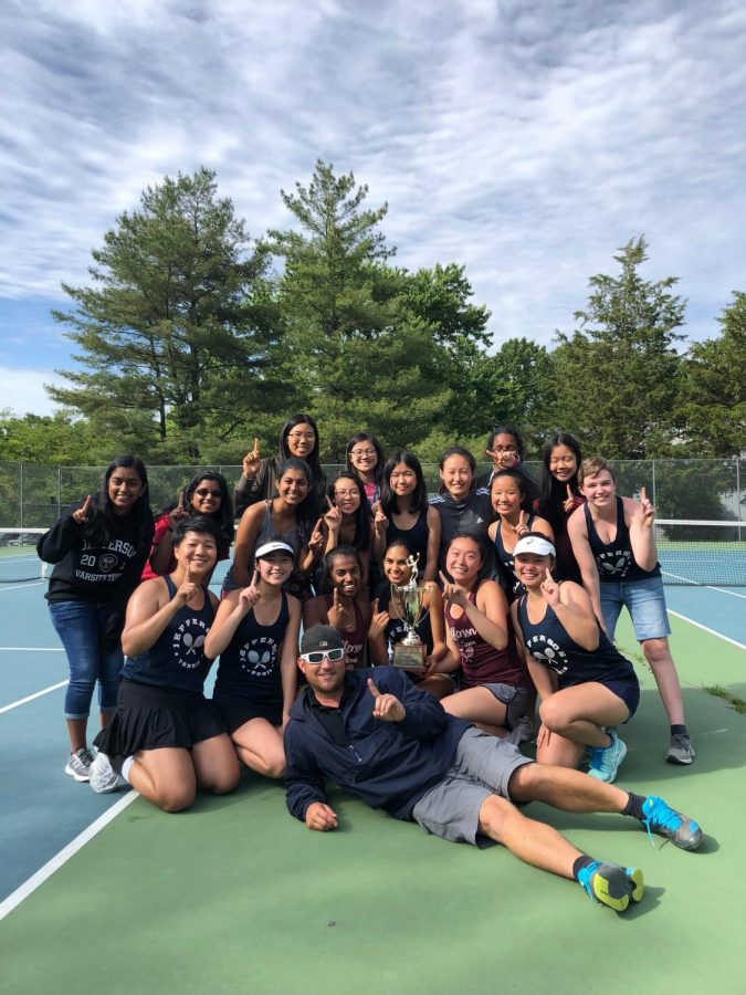 The+Jefferson+girls+tennis+team+poses+for+a+photo+after+their+victory+at+the+5C+regional+competition.+