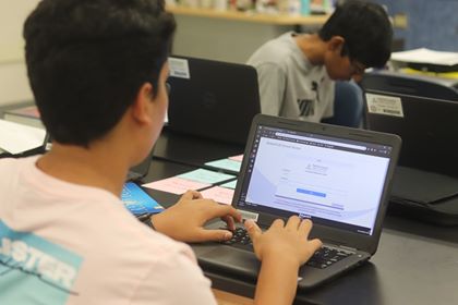 A student uses an FCPSOn computer to access the internet during class. Photo courtesy of Anushka Molugu.