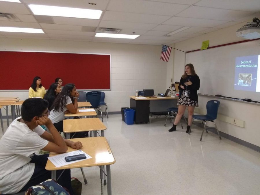 At the interest meeting, Alumni Coordinator Samantha Krause and Development Coordinator Miriam Lamoreaux discussed the Ambassadors Program and its application requirements.  Photo credits: Aumena Choudhry.