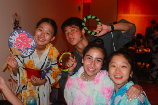 Senior Mia Yang, right, wears a traditional Japanese dress with her fellow campers during the Japanese cultural festival.
