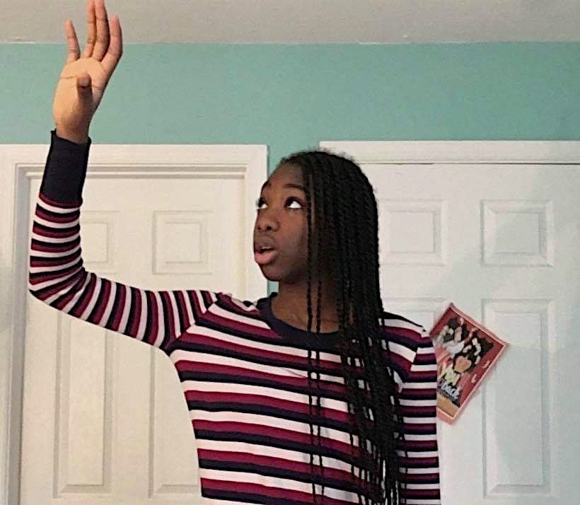 Sophomore Dami Awofisayo practices the physical aspects of her performance by planning some movements. “I take a video myself to see where I felt awkward and assessed my physical presence,” Awofisayo said.