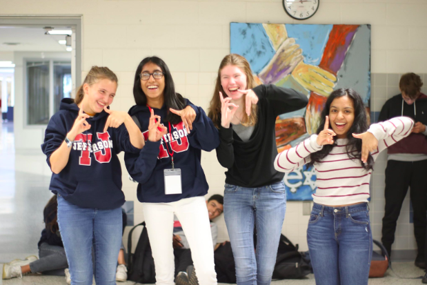 German exchange students having fun while teaching German culture to Jefferson students, Celia Vander Ploeg Fallon (second from left) and Nimisha Panabakam (far right). 