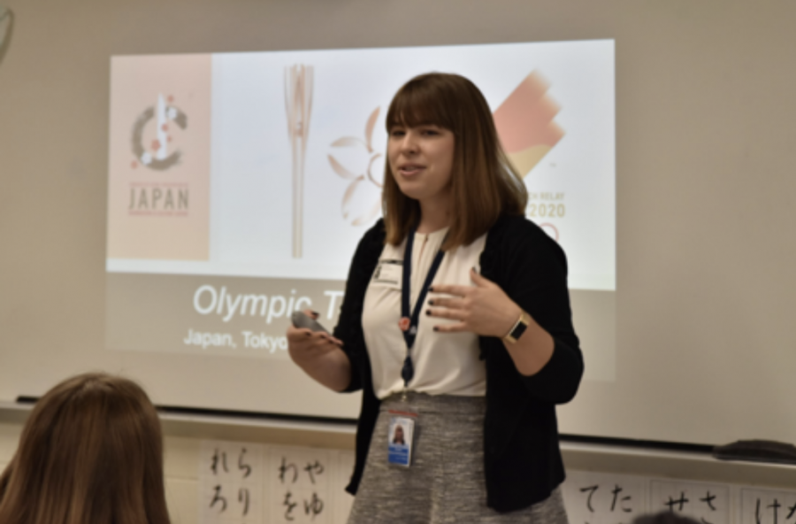 Representative Melinda Marquardt introduces herself and the history behind Tokyo’s plans for the 2020 Olympic Games. “The Embassy contacted us first,” Japanese Teacher Koji Otani explains. “They wanted us to promote the Tokyo Olympics.” 
