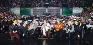 The seven members of K-pop group SuperM, from left to right are Mark, Kai, Taeyong, Taemin, Lucas, Baekhyun, and Ten, pose at their concert at Eagle Bank Arena on Nov. 17th. 
