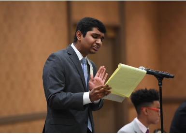 At the 2019 National Speech and Debate Association National Tournament, senior Manu Onteeru speaks passionately to a panel of judges about data privacy and stricter government regulations. Photo by Grace Rogers.