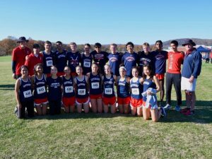 Placing their arms around each other, the cross-country team poses for a picture after the Regionals competition “At regionals, [the boy’s team] got 3rd place and qualified for the state meet. The girls team also got 3rd and qualified, and we are all really happy about it.” cross-country captain Tucker Stanley said.