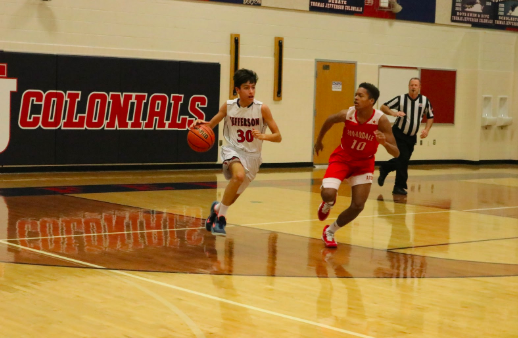 Guarded by an Annandale Atoms defender, sophomore Nathan Singhvi dribbles the ball hoping to make a successful pass. The game is competitive as both teams try to score their first win of the season.
