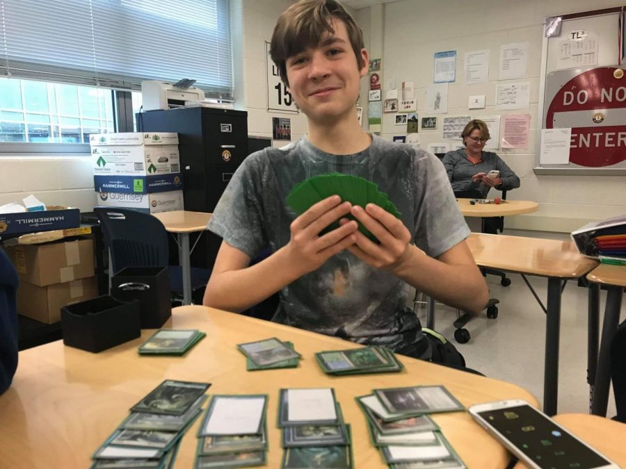 Sophomore+Chris+Santoro+plays+a+game+of+Magic%3A+The+Gathering.