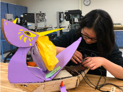 Freshman Mira Kim makes checks on the ship to see if everything still works. “The majority of building the toy was stressful, but it was still pretty fun,” Kim said.