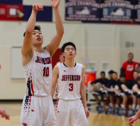 Senior Alex Yu, 10, shoots a free throw during a game earlier in the season. Yu has emerged as a standout athlete during his time at Jefferson
