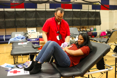 Senior Emaya Anand finishes getting her blood drawn for her donation to the Red Cross Blood Drive at Jefferson.
