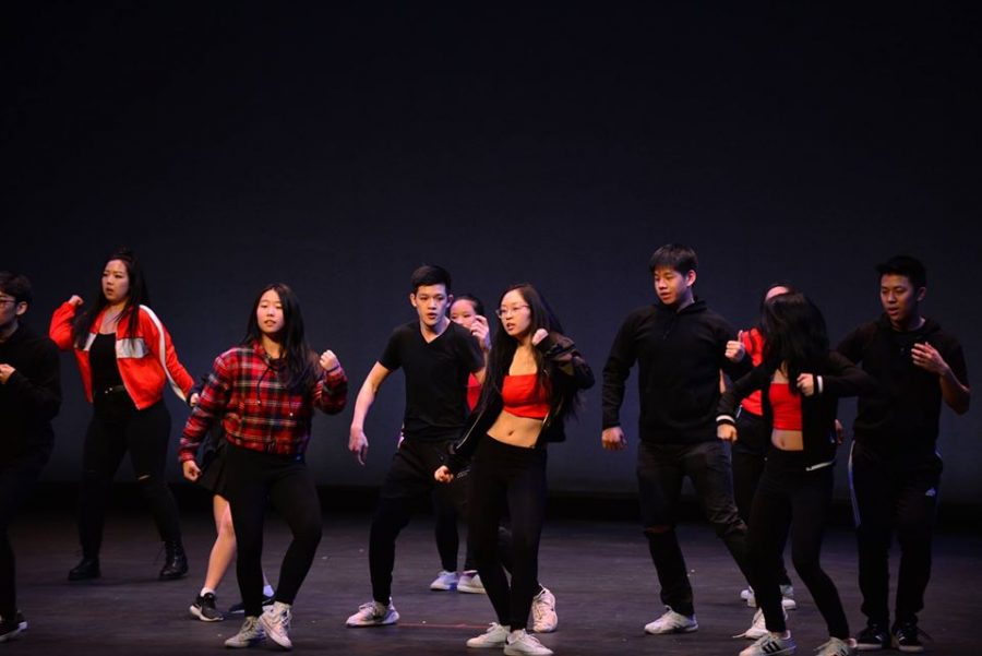 Julia+Chen+dances+in+the+front+row+of+the+2019+KCC+iNite+performance.