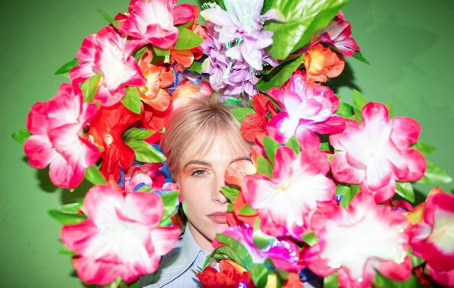 Hayley Williams surrounds herself in flowers in this album art for Petals for Armor