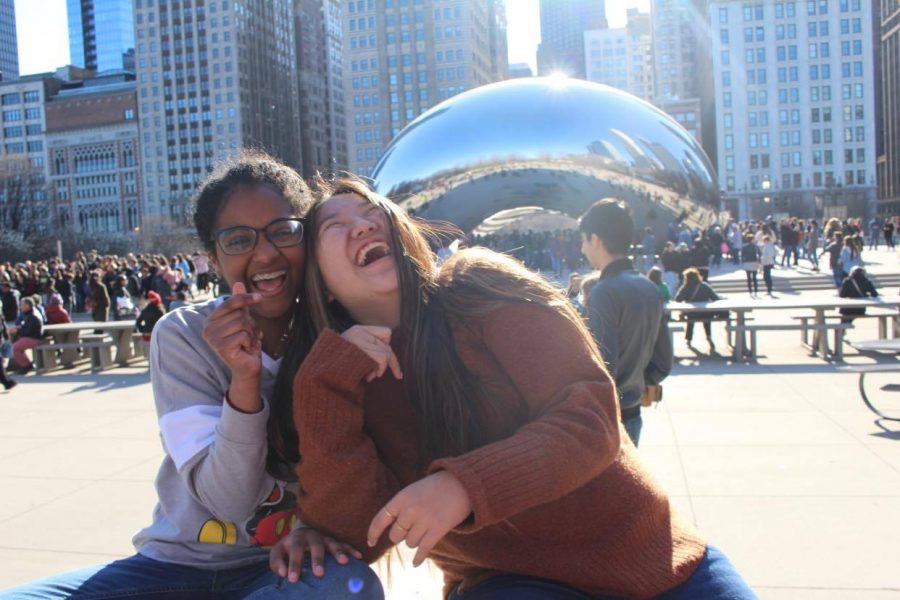 On a trip to Chicago, senior Didi Elsyad and a friend pose for a picture in front of the Cloud Gate.