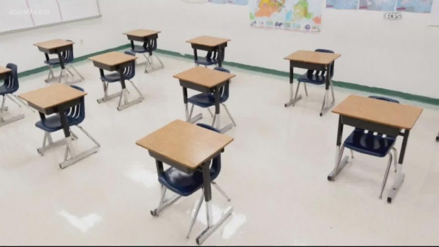 Student+desks+are+left+unfilled+in+Fairfax+County+Public+School+%28FCPS%29+building+due+to+the+COVID-19+pandemic.
