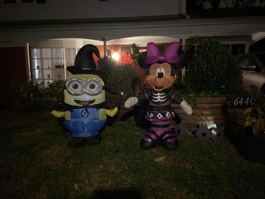 Minnie+Mouse+and+Minion+inflatables+are+set+up+as+part+of+many+decorations+to+celebrate+Halloween.