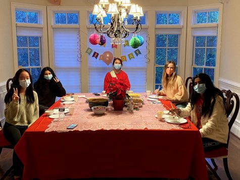 From left to right, seniors Zia Sun, Sahana Ramesh, Julia Kao-Sowa, Julia Feldhaus, and Anoushka Sarkar celebrate "Friendsgiving" as well as Kao-Sowa's 18th birthday on Friday, Nov. 27.