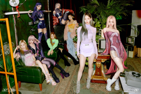 Aespa poses for their first full-group photoshoot. From left to right, the eight members are Winter, aeWinter, aeGiselle, Giselle, aeNingNing, NingNing, Karina, and aeKarina. Photo courtesy of allkpop.com.