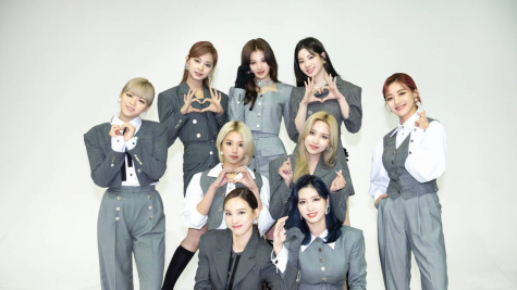 Twice poses for a group photo for the title track “I CAN’T STOP ME” promotions in South Korea. From the back row to the front row and left to right, the nine members are Tzuyu, Sana, Dahyun, Jeongyeon, Chaeyoung, Mina, Jihyo, Nayeon, and Momo. 