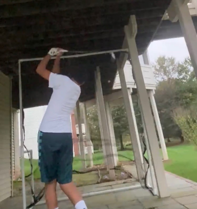 Junior Jason Yi practices golf to kick off winter break.