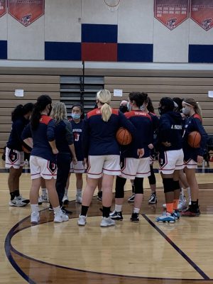 Photo courtesy of TJ Colonials Sports. “[At tryouts] masks were required at all times, and santization stations were set up so that after a ball was used, someone could clean it,” Anjali Maddipatla, a freshman on the varsity team, said. “We were required to bring our own water bottles so we didn’t have to share.”
